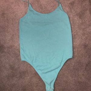 Teal body suit
